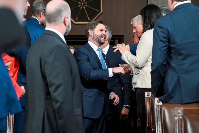 US Vice President JD Vance arrives at the House Chamber before President Donald Trump delivers the first State of the Union address of his second term to a joint session of Congress in the House Chamber of the United States Capitol in Washington, DC, on February 24, 2026. (Photo by Kenny HOLSTON / POOL / AFP)