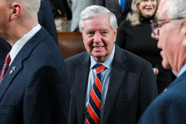 US Senator Lindsey Graham, Republican of South Carolina, arrives at the House Chamber before President Donald Trump delivers the first State of the Union address of his second term to a joint session of Congress in the House Chamber of the United States Capitol in Washington, DC, on February 24, 2026. (Photo by Kenny HOLSTON / POOL / AFP)