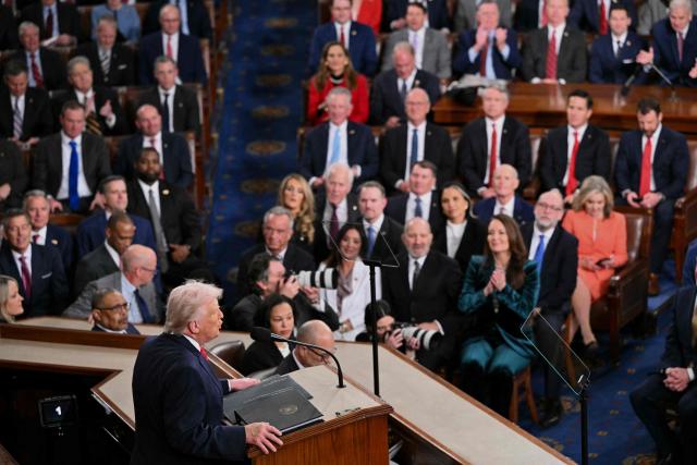 US President Donald Trump delivers the State of the Union address in the House Chamber of the US Capitol in Washington, DC, on February 24, 2026. (Photo by Mandel NGAN / AFP)
