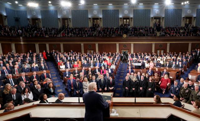 US President Donald Trump delivers the State of the Union address to a joint session of Congress in the House Chamber at the US Capitol in Washington, DC, on February 24, 2026. (Photo by Jessica Koscielniak / POOL / AFP)