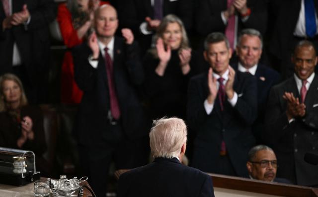 US President Donald Trump delivers the State of the Union address in the House Chamber of the US Capitol in Washington, DC, on February 24, 2026. (Photo by Brendan SMIALOWSKI / AFP)