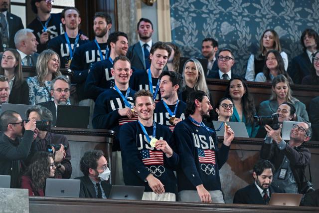 Members of the United States Olympic Men’s Ice Hockey Teamare seen in the gallery as President Donald J. Trump delivers the first State of the Union address of his second term to a joint session of Congress in the House Chamber of the United States Capitol in Washington, DC, on February 24, 2026. (Photo by Kenny HOLSTON / POOL / AFP)
