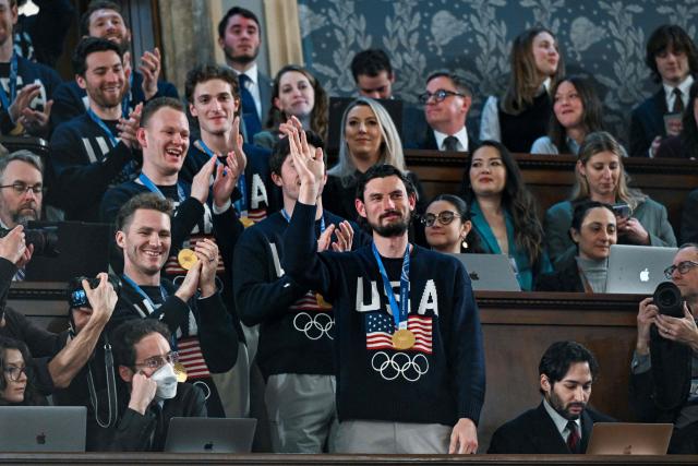 Members of the United States Olympic Men’s Ice Hockey Teamare seen in the gallery as President Donald J. Trump delivers the first State of the Union address of his second term to a joint session of Congress in the House Chamber of the United States Capitol in Washington, DC, on February 24, 2026. (Photo by Kenny HOLSTON / POOL / AFP)