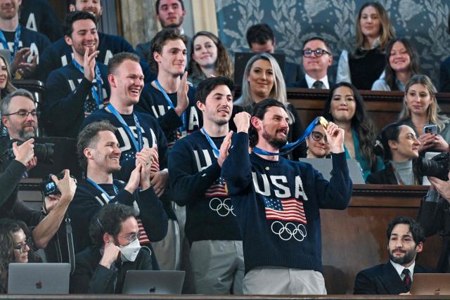 Members of the United States Olympic Men’s Ice Hockey Teamare seen in the gallery as President Donald J. Trump delivers the first State of the Union address of his second term to a joint session of Congress in the House Chamber of the United States Capitol in Washington, DC, on February 24, 2026. (Photo by Kenny HOLSTON / POOL / AFP)