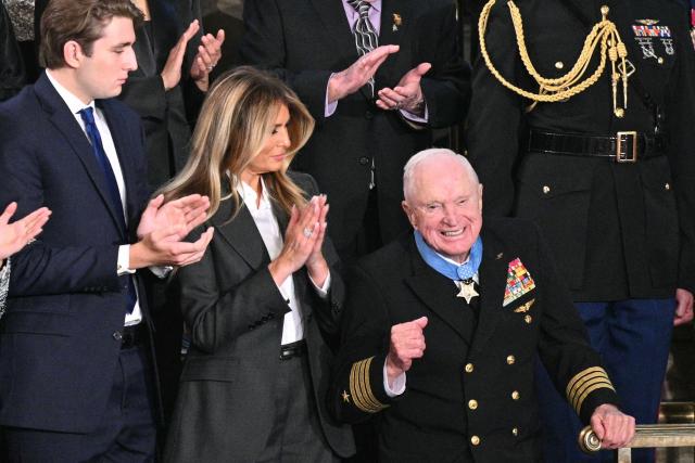 US veteran Captain E. Royce Williams reacts after receiving the Medal of Honor during US President Donald Trump's the State of the Union address in the House Chamber of the US Capitol in Washington, DC, on February 24, 2026. (Photo by Mandel NGAN / AFP)