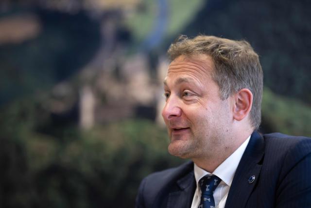 EU Commissioner for Agriculture, Christophe Hansen, speaks during an interview at the EU headquarters in Brussels on February 24, 2026. Forty million euros for French wine producers, and a one-year suspension of taxes on part of fertilizer imports: in an interview with AFP, European Commissioner for Agriculture Christophe Hansen highlighted support measures for farmers ahead of his visit to the Agricultural Show on February 24, 2026. (Photo by JOHN THYS / AFP)