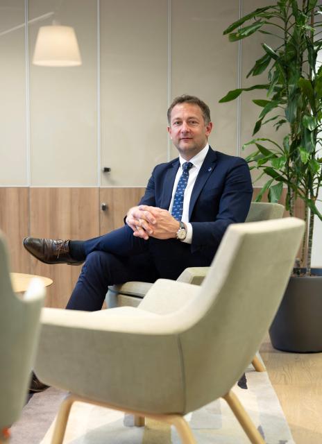 EU Commissioner for Agriculture, Christophe Hansen, poses during an interview at the EU headquarters in Brussels on February 24, 2026. Forty million euros for French wine producers, and a one-year suspension of taxes on part of fertilizer imports: in an interview with AFP, European Commissioner for Agriculture Christophe Hansen highlighted support measures for farmers ahead of his visit to the Agricultural Show on February 24, 2026. (Photo by JOHN THYS / AFP)