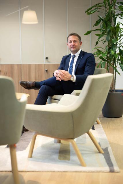 EU Commissioner for Agriculture, Christophe Hansen, poses during an interview at the EU headquarters in Brussels on February 24, 2026. Forty million euros for French wine producers, and a one-year suspension of taxes on part of fertilizer imports: in an interview with AFP, European Commissioner for Agriculture Christophe Hansen highlighted support measures for farmers ahead of his visit to the Agricultural Show on February 24, 2026. (Photo by JOHN THYS / AFP)