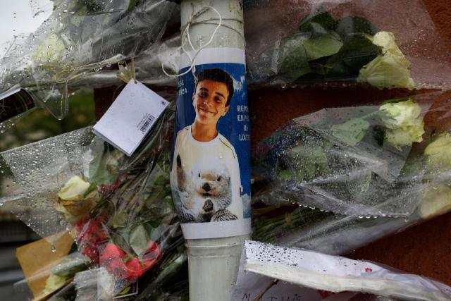(FILES) Flower tributes are placed at the site where 15-year-old Matisse was stabbed during an altercation, in Chateauroux, central France, on May 4, 2024. The mother of the teenager sentenced to eight years in prison for the murder of Matisse, who was killed at 15 years old by several stab wounds in April 2024 in Chateauroux, will in turn be tried on February 27, 2026, suspected of having also struck the victim. (Photo by Guillaume SOUVANT / AFP)