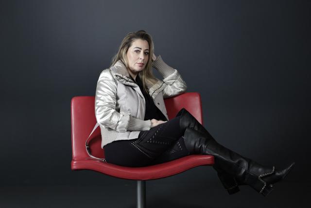 French influencer agent Magali Berdah poses during a photo session in Paris on February 24, 2026. "A death sentence" that "isn't limited to the web": influencer agent Magali Berdah, whose complaint against French rapper Booba led to a trial, describes the devastating impact of cyberbullying on her life, encouraging victims to seek justice. (Photo by STEPHANE DE SAKUTIN / AFP)