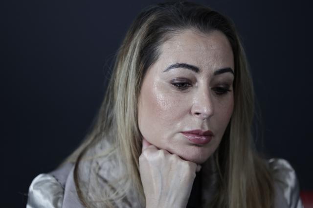 French influencer agent Magali Berdah poses during a photo session in Paris on February 24, 2026. "A death sentence" that "isn't limited to the web": influencer agent Magali Berdah, whose complaint against French rapper Booba led to a trial, describes the devastating impact of cyberbullying on her life, encouraging victims to seek justice. (Photo by STEPHANE DE SAKUTIN / AFP)