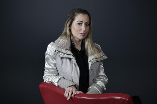 French influencer agent Magali Berdah poses during a photo session in Paris on February 24, 2026. "A death sentence" that "isn't limited to the web": influencer agent Magali Berdah, whose complaint against French rapper Booba led to a trial, describes the devastating impact of cyberbullying on her life, encouraging victims to seek justice. (Photo by STEPHANE DE SAKUTIN / AFP)