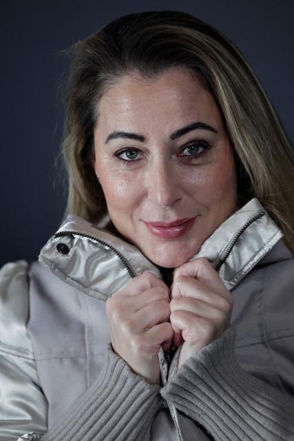 French influencer agent Magali Berdah poses during a photo session in Paris on February 24, 2026. "A death sentence" that "isn't limited to the web": influencer agent Magali Berdah, whose complaint against French rapper Booba led to a trial, describes the devastating impact of cyberbullying on her life, encouraging victims to seek justice. (Photo by STEPHANE DE SAKUTIN / AFP)