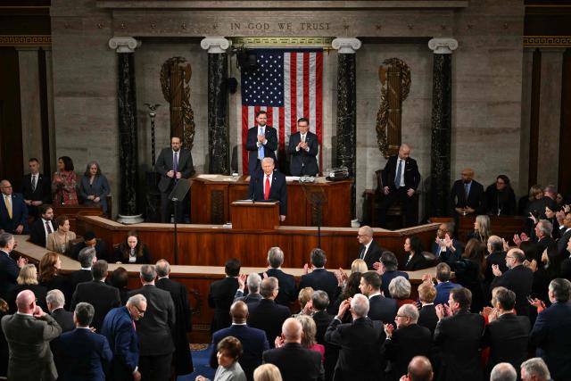 US President Donald Trump concludes his remarks during the State of the Union address in the House Chamber of the US Capitol in Washington, DC, on February 24, 2026. (Photo by ANDREW CABALLERO-REYNOLDS / AFP)