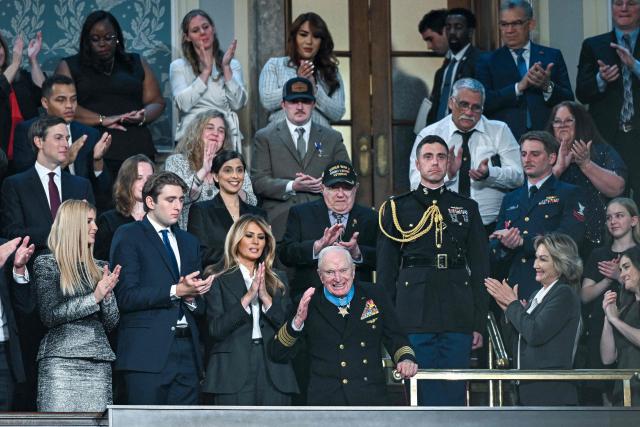 Royce Williams receives the Congressional Medal of Honor as President Donald Trump delivers the first State of the Union address of his second term to a joint session of Congress in the House Chamber of the United States Capitol in Washington, DC, on February 24, 2026. (Photo by Kenny HOLSTON / POOL / AFP)