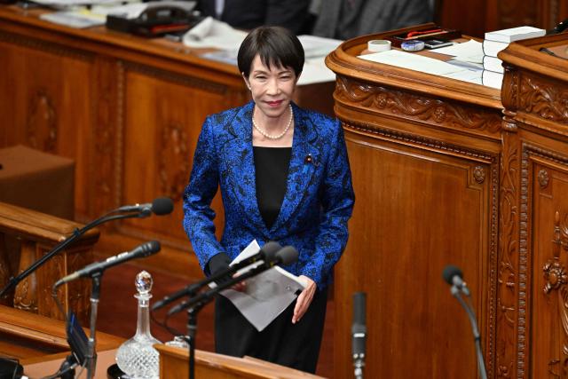Japan's Prime Minister Sanae Takaichi attends a plenary session of the House of Representatives in parliament in Tokyo on February 25, 2026. (Photo by Kazuhiro NOGI / AFP)