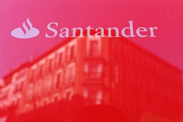(FILES) The logo of a Santander bank is pictured in Madrid on May 14, 2019. Spanish bank Santander said on February 25, 2026 it is targeting net profit of over 20 billion euros ($21.7 billion) by 2028, up from 14.1 billion euros in 2025, as part of a new three-year strategic plan. (Photo by GABRIEL BOUYS / AFP)