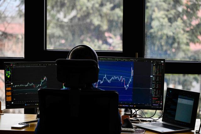 People work in a co-working centre in Bansko on February 13, 2026. Bulgaria's largest ski resort of Bansko in Pirin mountain is becoming a hub for digital nomads, copywriters, enterpreneurs and retirees from around the world. (Photo by Nikolay DOYCHINOV / AFP) / TO GO WITH AFP STORY BY ROSSEN BOSSEV