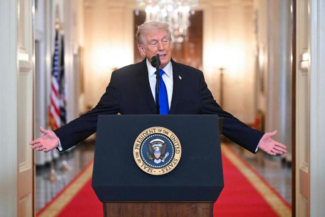 (FILES) US President Donald Trump speaks during the Angel Families Remembrance Ceremony in the East Room of the White House in Washington, DC, on February 23, 2026. Twenty-nine people in total have been sent to Equatorial Guinea, held by armed guards, as part of an opaque $7.5 million deal with the Trump administration, according to a report by Senate Democrats. All 29 had been previously been granted deportation protections. (Photo by SAUL LOEB / AFP)