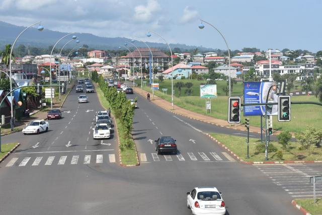 (FILES) A general view of a street in Malabo, Equatorial Guinea, on June 5, 2020. Twenty-nine people in total have been sent to Equatorial Guinea, held by armed guards, as part of an opaque $7.5 million deal with the Trump administration, according to a report by Senate Democrats. All 29 had been previously been granted deportation protections. (Photo by Samuel OBIANG / AFP)