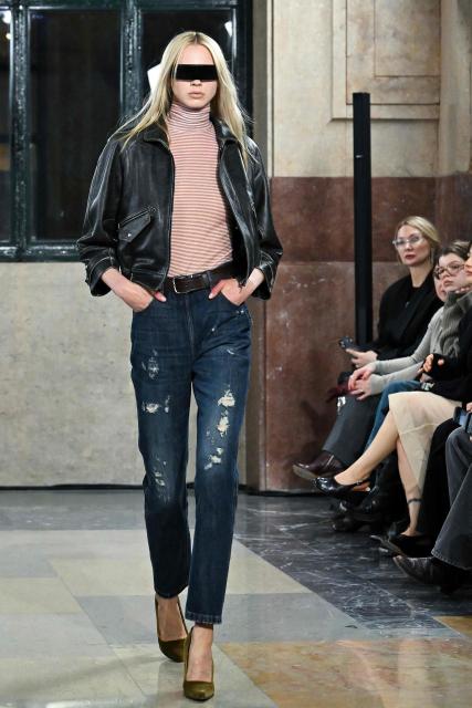 A model presents a creation by MM6 Margiela during a fashion show as part of the Milan Fashion Week Womens-Mens collection Fall-Winter 2026-2027, in Milan on February 25, 2026. (Photo by Andreas SOLARO / AFP)