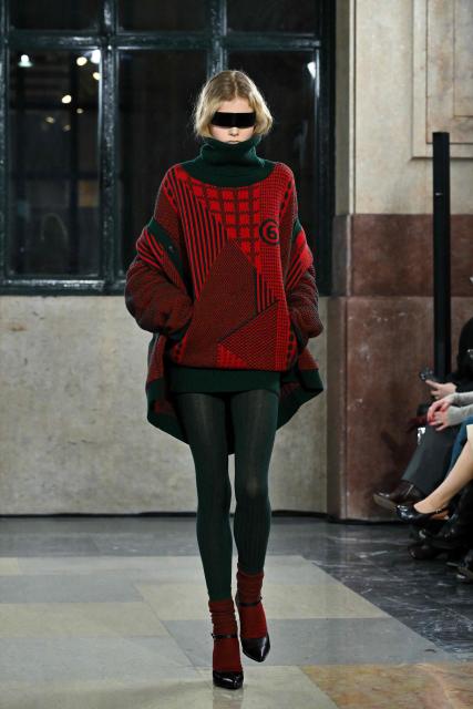 A model presents a creation by MM6 Margiela during a fashion show as part of the Milan Fashion Week Womens-Mens collection Fall-Winter 2026-2027, in Milan on February 25, 2026. (Photo by Andreas SOLARO / AFP)