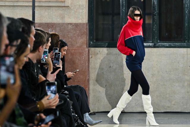A model presents a creation by MM6 Margiela during a fashion show as part of the Milan Fashion Week Womens-Mens collection Fall-Winter 2026-2027, in Milan on February 25, 2026. (Photo by Andreas SOLARO / AFP)