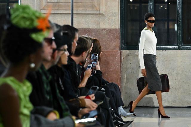 A model presents a creation by MM6 Margiela during a fashion show as part of the Milan Fashion Week Womens-Mens collection Fall-Winter 2026-2027, in Milan on February 25, 2026. (Photo by Andreas SOLARO / AFP)