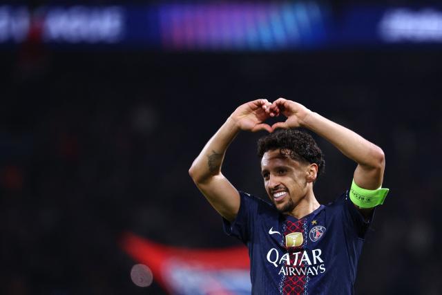 TOPSHOT - Paris Saint-Germain's Brazilian defender #05 Marquinhos celebrates after scoring Paris Saint-Germain's first goal during the UEFA Champions League play-off second leg football match between Paris Saint-Germain (PSG) and AS Monaco at the Parc des Princes stadium in Paris on February 25, 2026. (Photo by FRANCK FIFE / AFP)