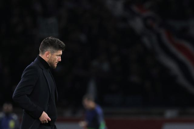 Monaco's Belgian head coach Sebastien Pocognoli  reacts after losing  the UEFA Champions League play-off second leg football match between Paris Saint-Germain (PSG) and AS Monaco at the Parc des Princes stadium in Paris on February 25, 2026. (Photo by Thomas SAMSON / AFP)