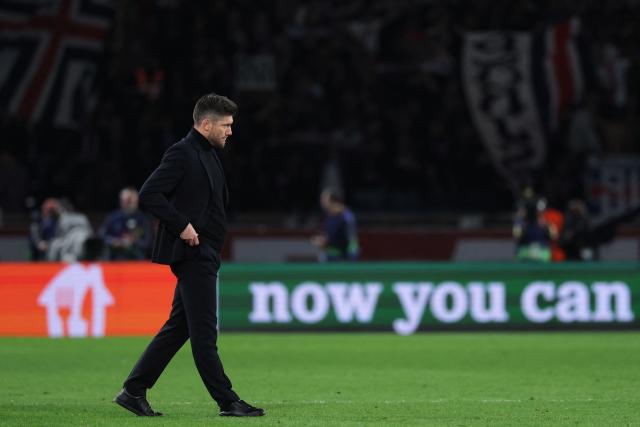 Monaco's Belgian head coach Sebastien Pocognoli  reacts after losing  the UEFA Champions League play-off second leg football match between Paris Saint-Germain (PSG) and AS Monaco at the Parc des Princes stadium in Paris on February 25, 2026. (Photo by Thomas SAMSON / AFP)