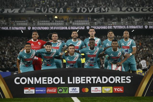 Players of Nacional Potosi pose for a picture ahead of the Copa Libertadores phase two second-leg football match between Brazil's Botafogo and Bolivia's Nacional Potosi at the Nilton Santos Stadium in Rio de Janeiro, Brazil, on February 25, 2026. (Photo by MAURO PIMENTEL / AFP)