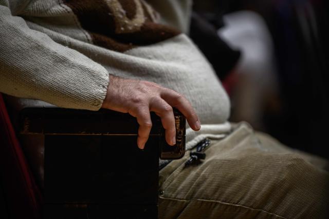 A psychiatric patient attends rehearsals of the Toulouse orchestra as part of the 'Résonance(s)' project to promote their recovery, at the Halle aux Grains theatre in Toulouse Southwestern France on February 10, 2026. The project was launched in 2023 through a partnership between the renowned Orchestre National du Capitole and several mental health institutions in the region. Its aim, in the face of conditions that can trap patients in a negative self-image, is to allow them to attend four rehearsals a year to initiate a process of reconnecting with others and the outside world, and simply to promote their recovery. (Photo by Ed JONES / AFP) / TO GO WITH AFP STORY BY Valentin GRAFF