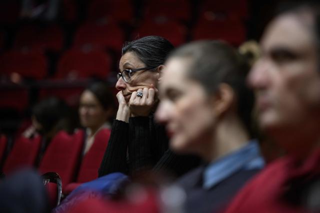 Psychiatric patients suffering from depression, bipolar disorder, schizophrenia, or personality disorders attend rehearsals of the Toulouse orchestra as part of the 'Résonance(s)' project to promote their recovery, at the Halle aux Grains theatre in Toulouse Southwestern France on February 10, 2026. The project was launched in 2023 through a partnership between the renowned Orchestre National du Capitole and several mental health institutions in the region. Its aim, in the face of conditions that can trap patients in a negative self-image, is to allow them to attend four rehearsals a year to initiate a process of reconnecting with others and the outside world, and simply to promote their recovery. (Photo by Ed JONES / AFP) / TO GO WITH AFP STORY BY Valentin GRAFF