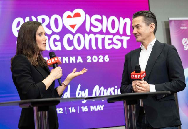 Moderator Austrian journalist Alexandra Maritza Wachter (L) speaks with the General Director of Austrian public broadcasting corporation ORF Roland Weissmann during a press conference on a media update of the Eurovision Song Contest 2026 (ESC) at ORF in Vienna, Austria, on February 26, 2026. The Austrian capital Vienna will host the Eurovision Song Contest 2026 from May 12 to 16, 2026. (Photo by Joe Klamar / AFP)