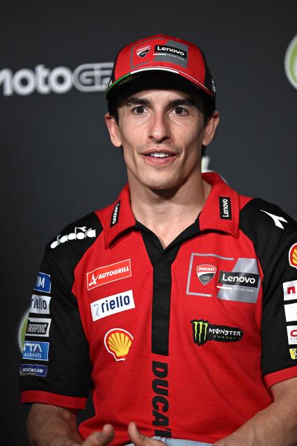 Ducati Lenovo Team's Spanish rider Marc Marquez speaks during a press conference at the Buriram International Circuit in Buriram on February 26, 2026, ahead of the Thailand MotoGP Grand Prix. (Photo by Lillian SUWANRUMPHA / AFP)