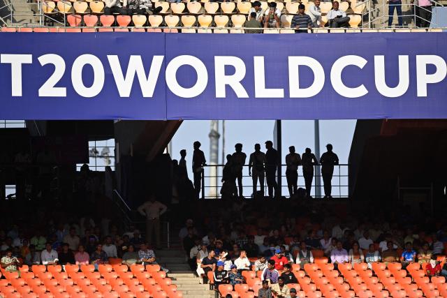 Spectators watch the 2026 ICC Men's T20 Cricket World Cup Super Eights match between West Indies and South Africa at Narendra Modi Stadium in Ahmedabad on February 26, 2026. (Photo by Shammi MEHRA / AFP)