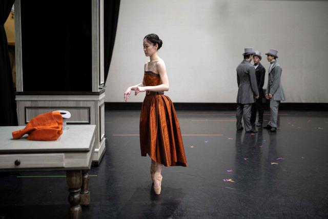 Ballet dancer Saeka Shirai, playing Marianna Lawton, prepares to take part in a full dress rehearsal of a production of "Gentleman Jack" in a rehearsal room of the Northern Ballet's headquarters in Leeds, northern England on February 24, 2026. Based on her diaries which were decoded after her death, "Gentleman Jack" portrays the life of the 19th century landowner and industrialist Anne Lister, who has been described as the  "first modern lesbian". The world premiere of the ballet takes place in Leeds on March 7. (Photo by Oli SCARFF / AFP)