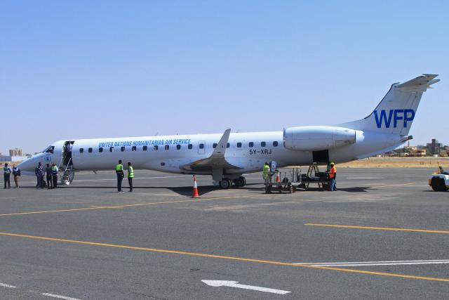 A World Food Programme (WFP) aircraft carrying Denise Brown, United Nations Humanitarian Coordinator in Sudan, arrives at the airport in Khartoum on February 26, 2026. (Photo by Ebrahim Hamid / AFP)