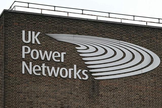 The logo for Britain's leading electricity distributor, UK Power Networks, is pictured at their offices in south London on February 26, 2026. French energy firm Engie said on February 25 it had signed an agreement to buy 100 percent of UK Power Networks electricity distributor for 10.5 billion pounds (14.2 billion USD). (Photo by JUSTIN TALLIS / AFP)