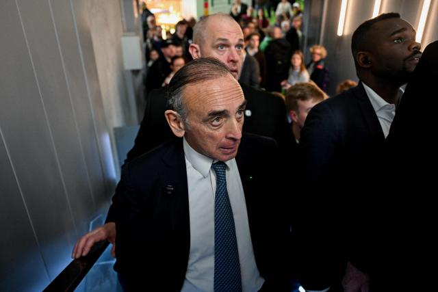 French far-right Reconquete party leader Eric Zemmour looks on as he visits the Paris International Agricultural Show (Salon de l'Agriculture) at Paris Expo Porte de Versailles in Paris on February 26, 2026. (Photo by Anna KURTH / AFP)