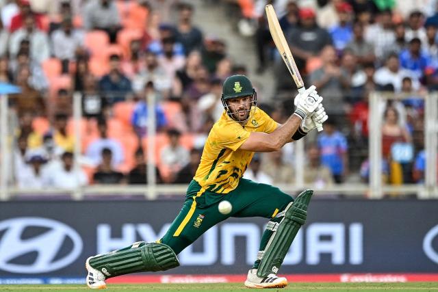 South Africa's captain Aiden Markram watches the ball after playing a shot during the 2026 ICC Men's T20 Cricket World Cup Super Eights match between West Indies and South Africa at Narendra Modi Stadium in Ahmedabad on February 26, 2026. (Photo by Shammi MEHRA / AFP)