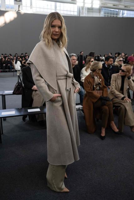 Former US model Ellie Thumann poses prior to the Max Mara collection's fashion show as part of the Milan Fashion Week Womens-Mens collection Fall-Winter 2026-2027, in Milan on February 26, 2026. (Photo by MIGUEL MEDINA / AFP)