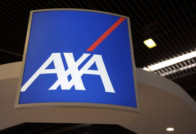 (FILES) A picture taken on February 4, 2015 shows the logo of AXA at the Salon des Entrepreneurs (entrepreneurship fair) in Paris. After a very good year in 2024, insurance giant Axa once again achieved record turnover and profits in 2025, driven by all of its activities and the sale of asset manager Axa IM. Net profit increased by 24% to Ђ9.8 billion, thanks to higher operating income and the gain from the sale of Axa Investment Managers (Axa IM) to BNP Paribas for Ђ5.1 billion in mid-2025. (Photo by ERIC PIERMONT / AFP)