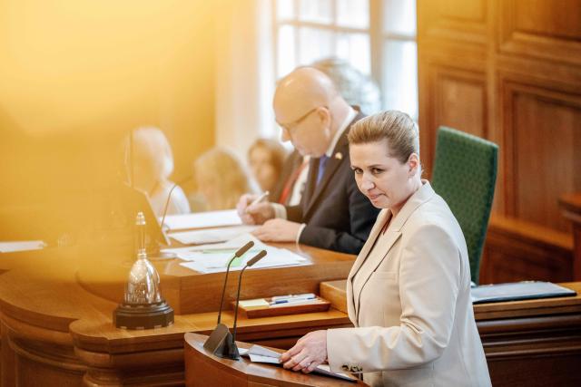 Prime Minister Mette Frederiksen (R) calls an election from the podium at Christiansborg in Copenhagen, Denmark, on February 26, 2026. Frederiksen said that she had scheduled this year's general election for March 24. (Photo by Mads Claus Rasmussen / Ritzau Scanpix / AFP) / Denmark OUT