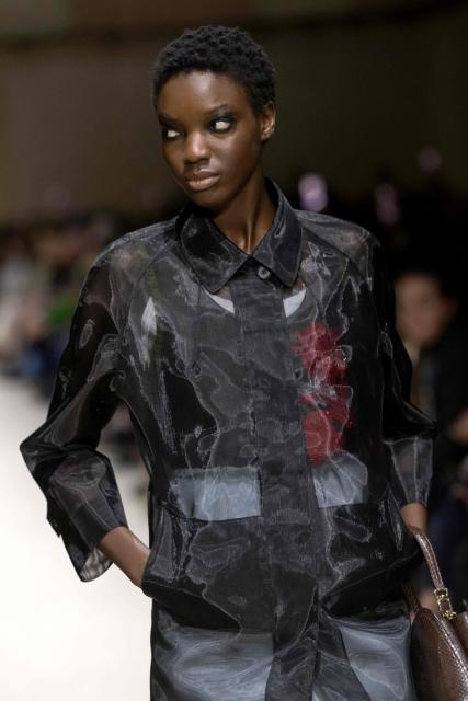 A model presents a creation of the Prada collection during the Milan Fashion Week Womens-Mens collection Fall-Winter 2026-2027, in Milan on February 26, 2026. (Photo by MIGUEL MEDINA / AFP)