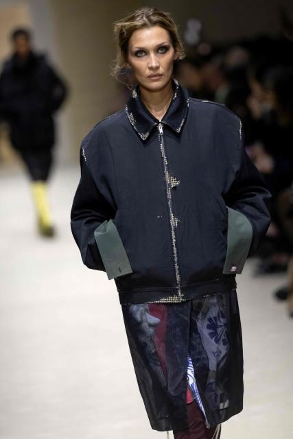 US model Bella Hadid presents a creation of the Prada collection during the Milan Fashion Week Womens-Mens collection Fall-Winter 2026-2027, in Milan on February 26, 2026. (Photo by MIGUEL MEDINA / AFP)