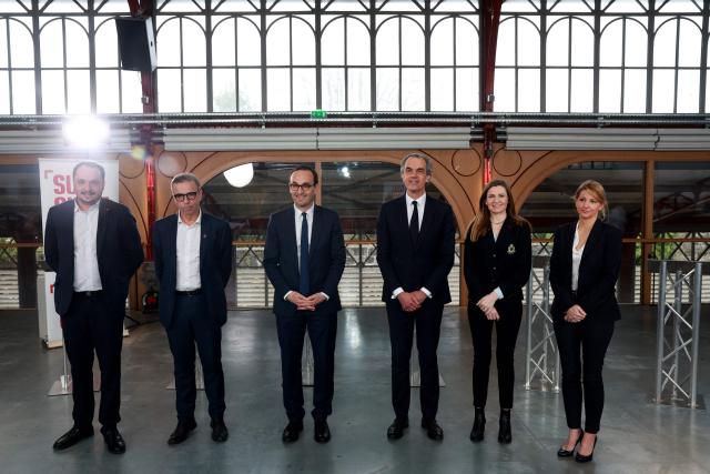 Six of the seven candidates in the Bordeaux municipal election — (L to R) Nordine Raymond, candidate for La France insoumise (LFI) party, Pierre Hurmic, incumbent mayor and ecologist candidate (Europe Йcologie–Les Verts), Thomas Cazenave, head of the Union de centre-droit list, Philippe Dessertine, independent candidate, Julie Rechagneux, candidate for the Rassemblement National party, and Virginie Bonthoux-Tournay, candidate for the Reconquete party — pose before a debate broadcast on the local TV channel TV7 in Bordeaux, south-western France, on February 26, 2026. (Photo by ROMAIN PERROCHEAU / AFP)