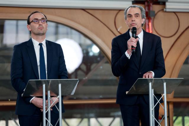 Candidates in the Bordeaux municipal election Thomas Cazenave (L), head of the Union de centre-droit list, and Philippe Dessertine, independent candidate, take part in a debate broadcast on the local TV channel TV7 in Bordeaux, south-western France, on February 26, 2026. (Photo by ROMAIN PERROCHEAU / AFP)