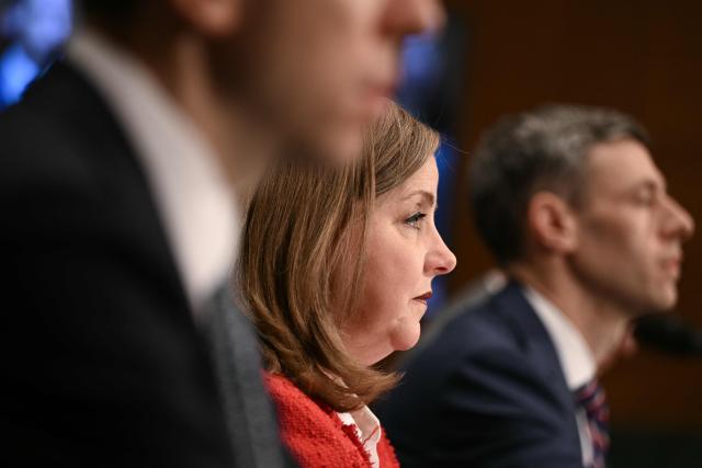 US Federal Reserve Vice Chair for Supervision Michelle Bowman (C) testifies during a Senate Committee on Banking, Housing, and Urban Affairs hearing titled "Update from the Prudential Regulators: Rightsizing Regulation to Promote American Opportunity," on Capitol Hill in Washington, DC on February 26, 2026. (Photo by Brendan SMIALOWSKI / AFP)